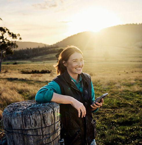 Farmer-Paddock-Sunset-Holding-Phone-Small