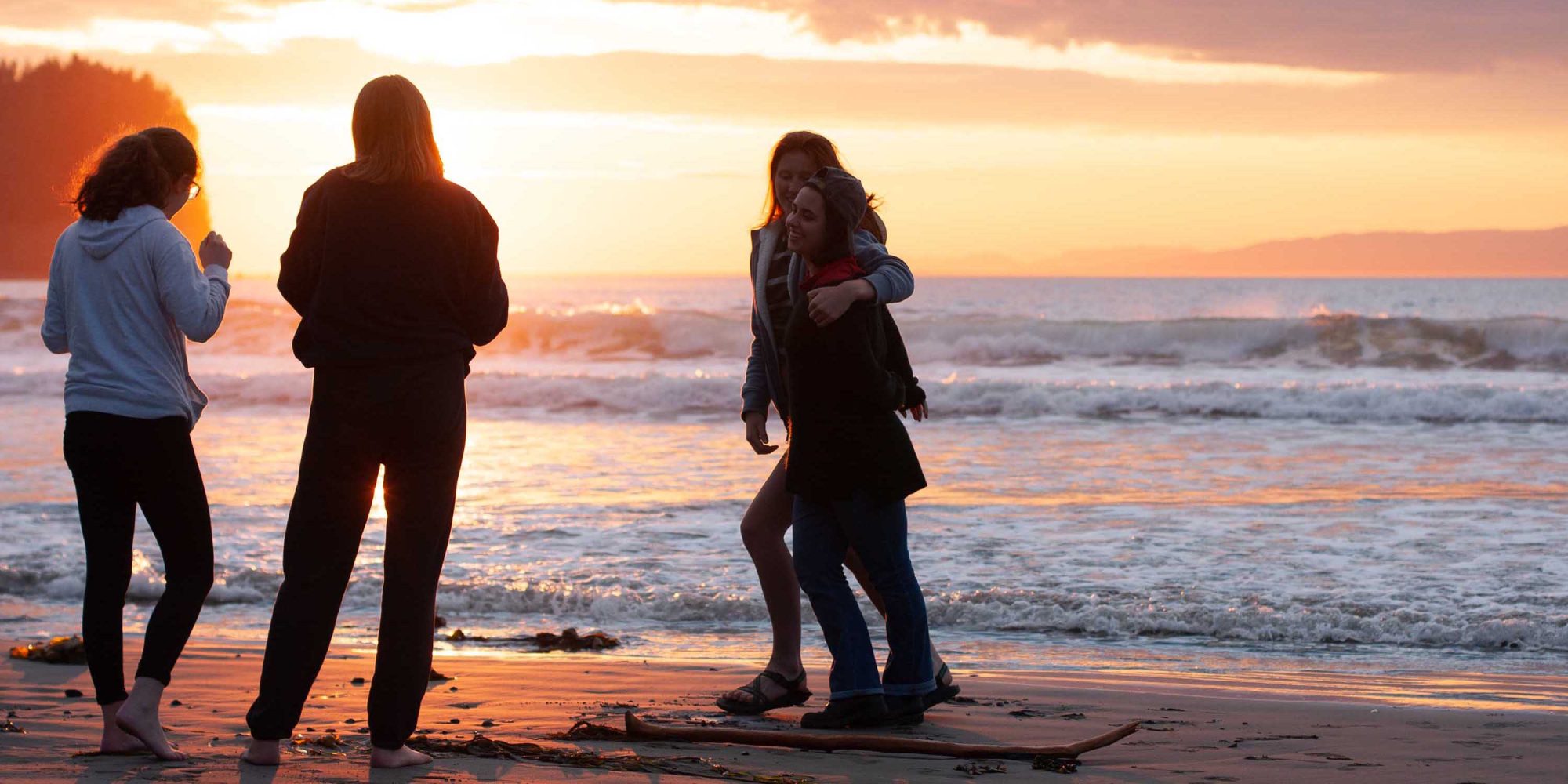 Friends at the Beach at Sunset-Banner