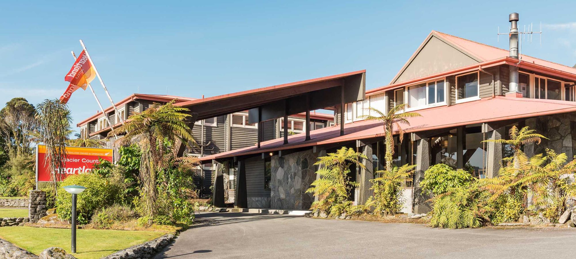 Heartland-Hotel-Glacier-Country-Exterior-Entrance-Banner