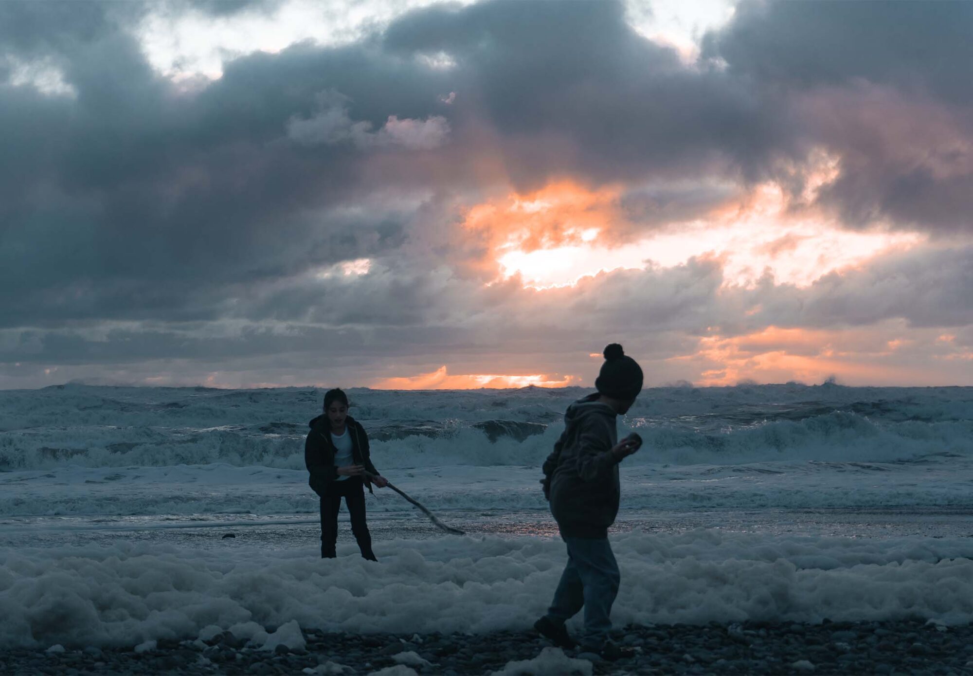 Kids Playing in the Sea Foam Punakaiki Beach_website_regular