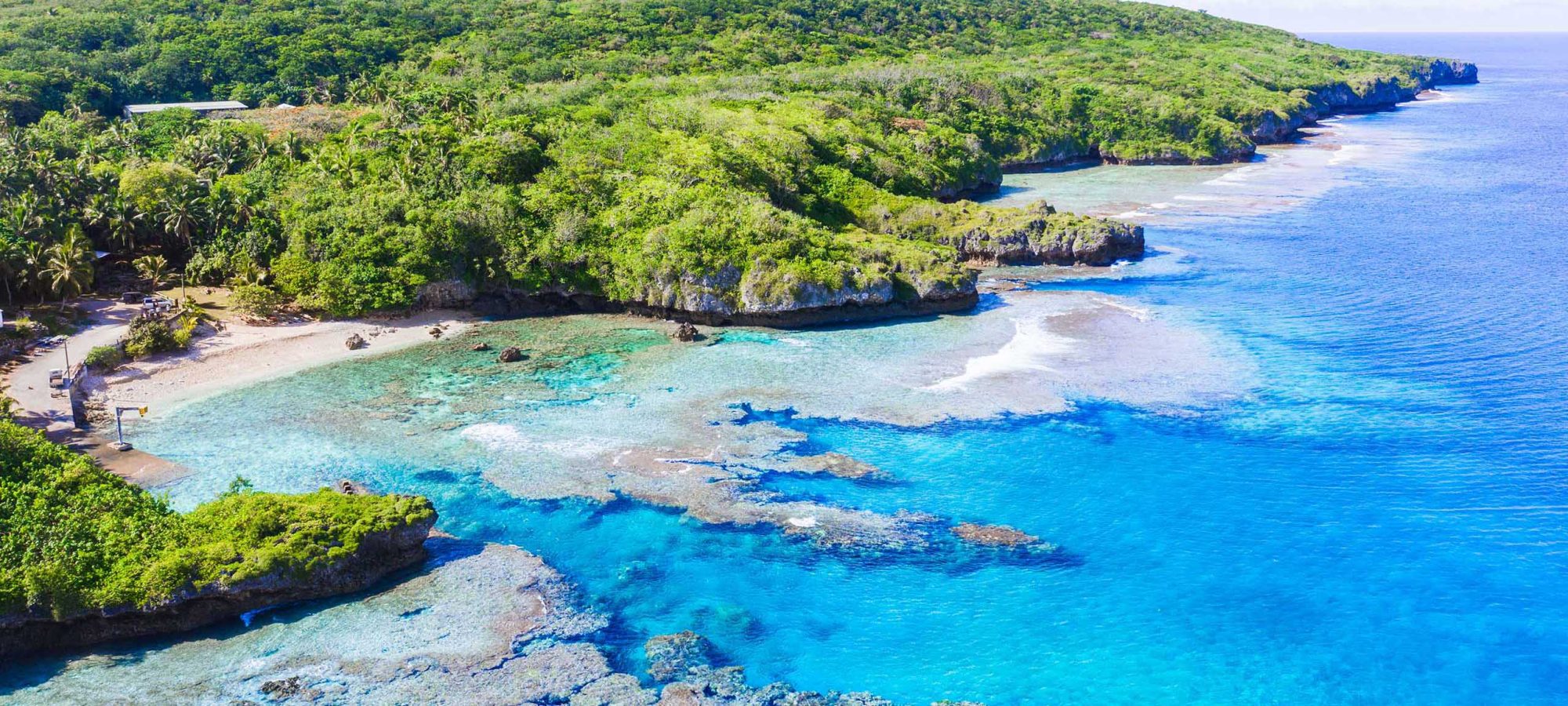 Niue-Island-Coast-Ocean-Avatele-Beach-Scenery-Aerial-Drone-View-1-Banner