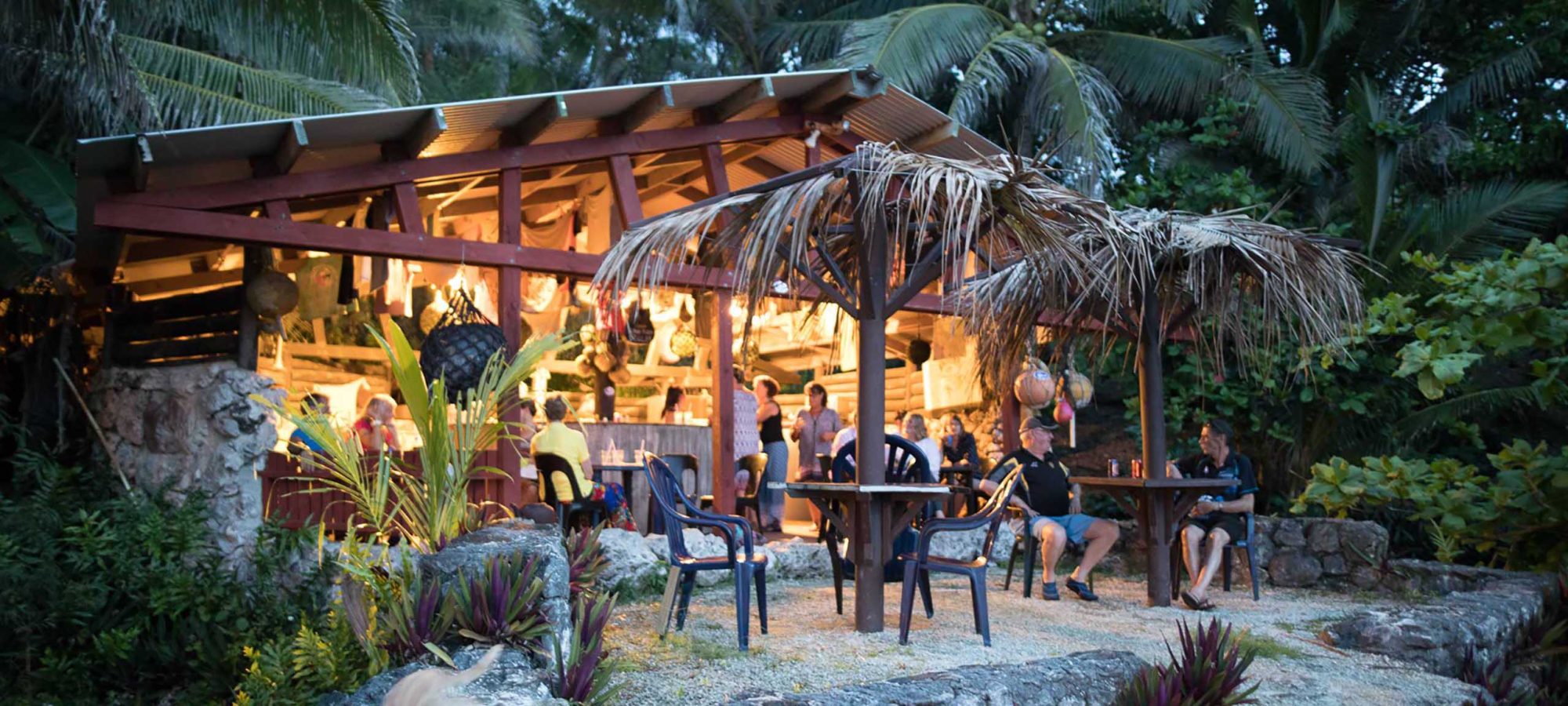 Niue-Island-Washaway-Cafe-Evening-Lights-People-Activities-Banner