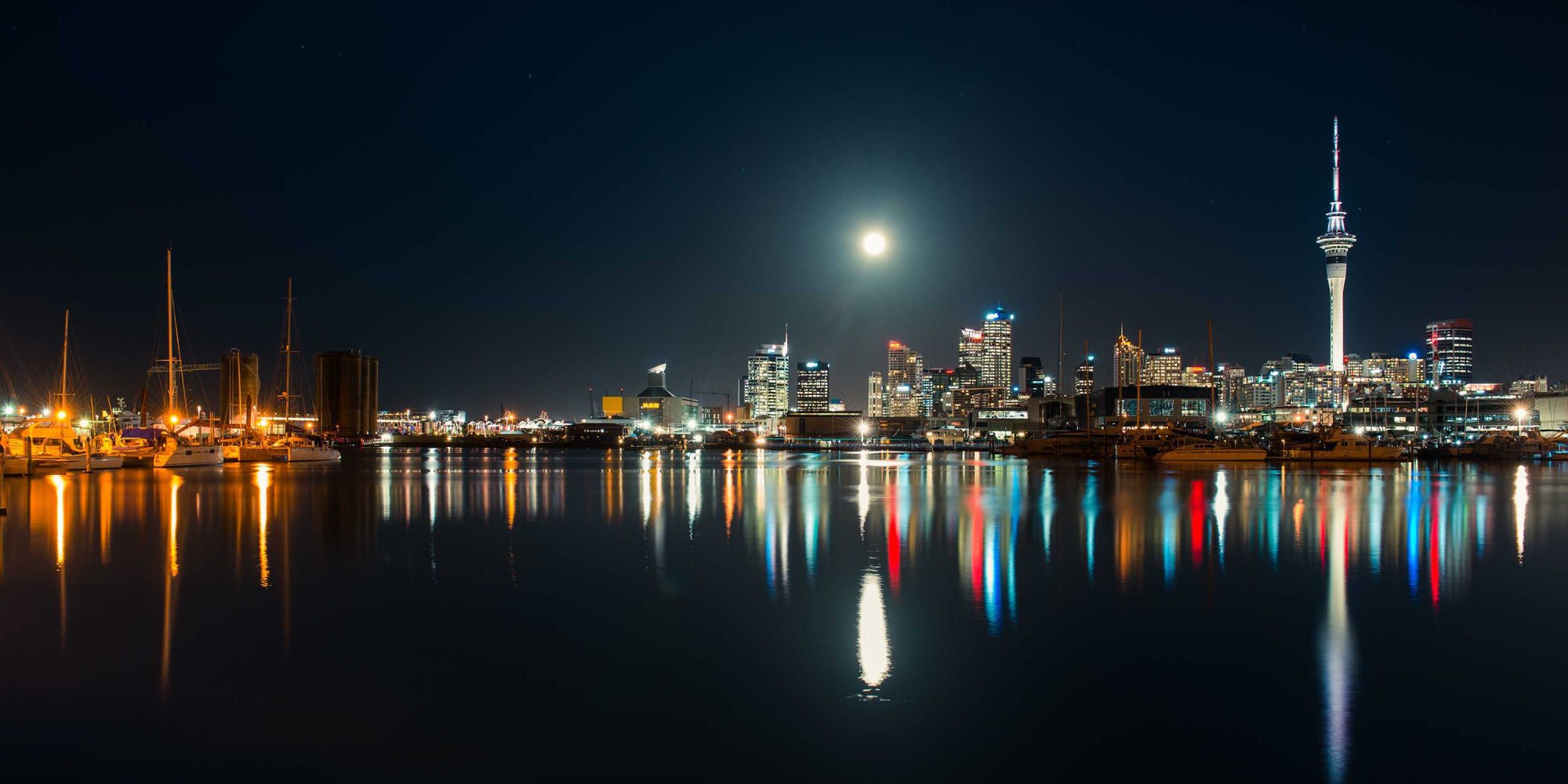 Region-Auckland-City-Night-Water-Reflection-Banner