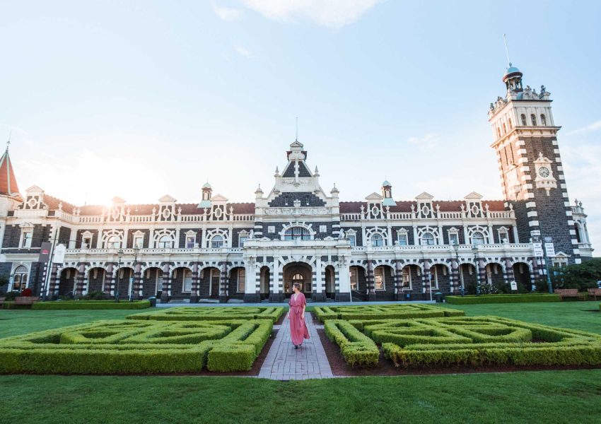 Region-Dunedin-Otago-Railway-Station-Building-Gardens-People-Sunset-Regular