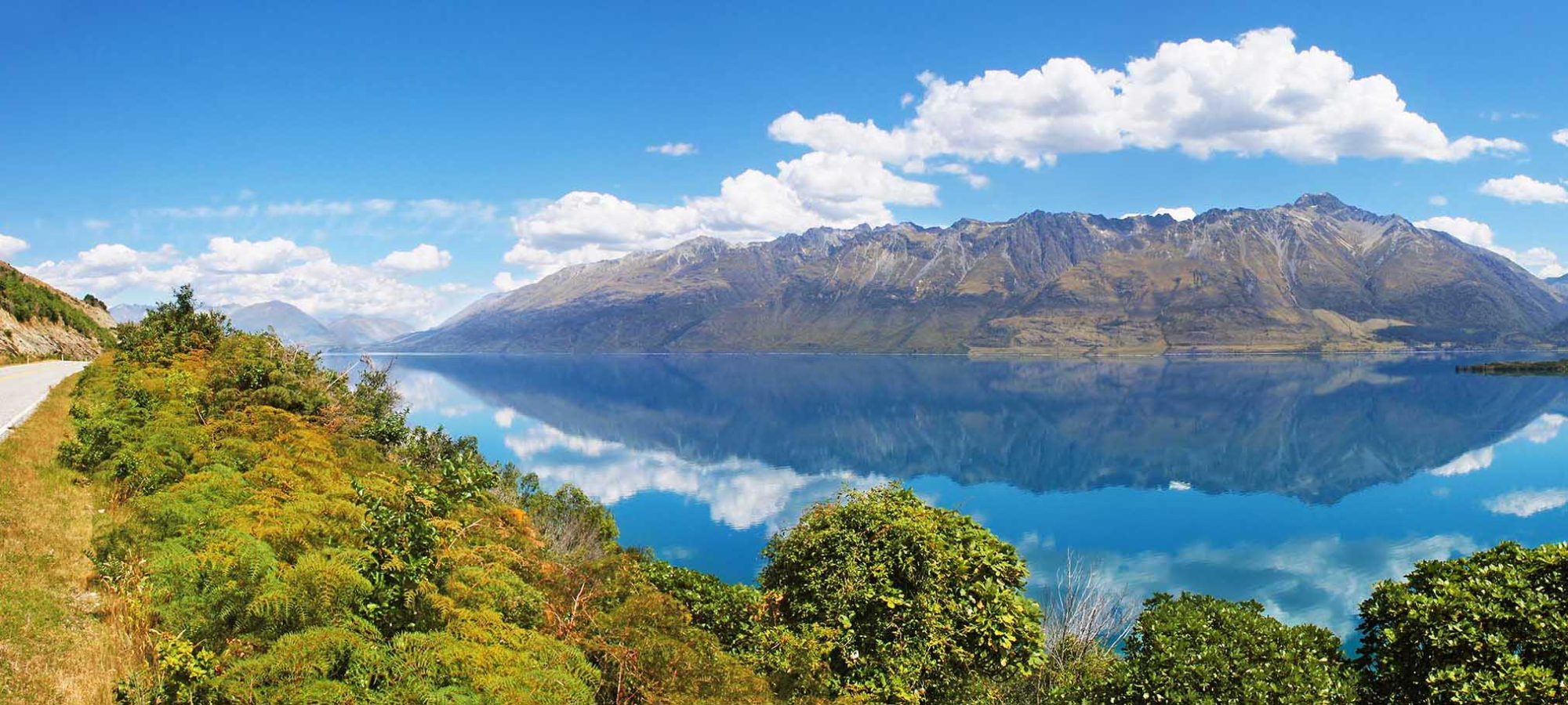 Region-Queenstown-Central-Otago-Scenery-Road-View-Lake-Wakatipu-Banner