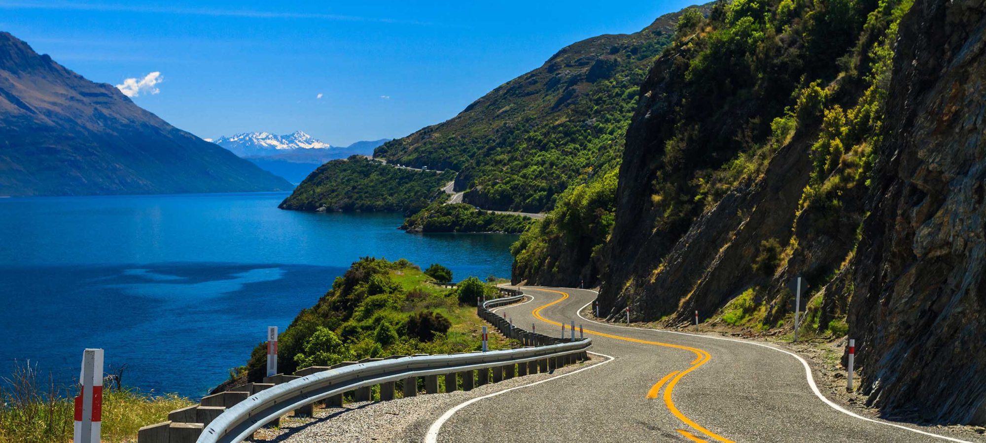 Region-Queenstown-Central-Otago-Scenery-View-Road-Mountains-Banner