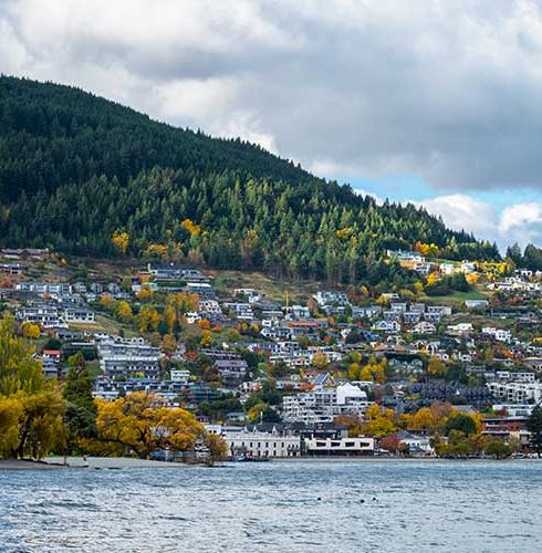 Beautiful cityscape during autumn of Queenstown city at sunset. Otago, New Zealand.