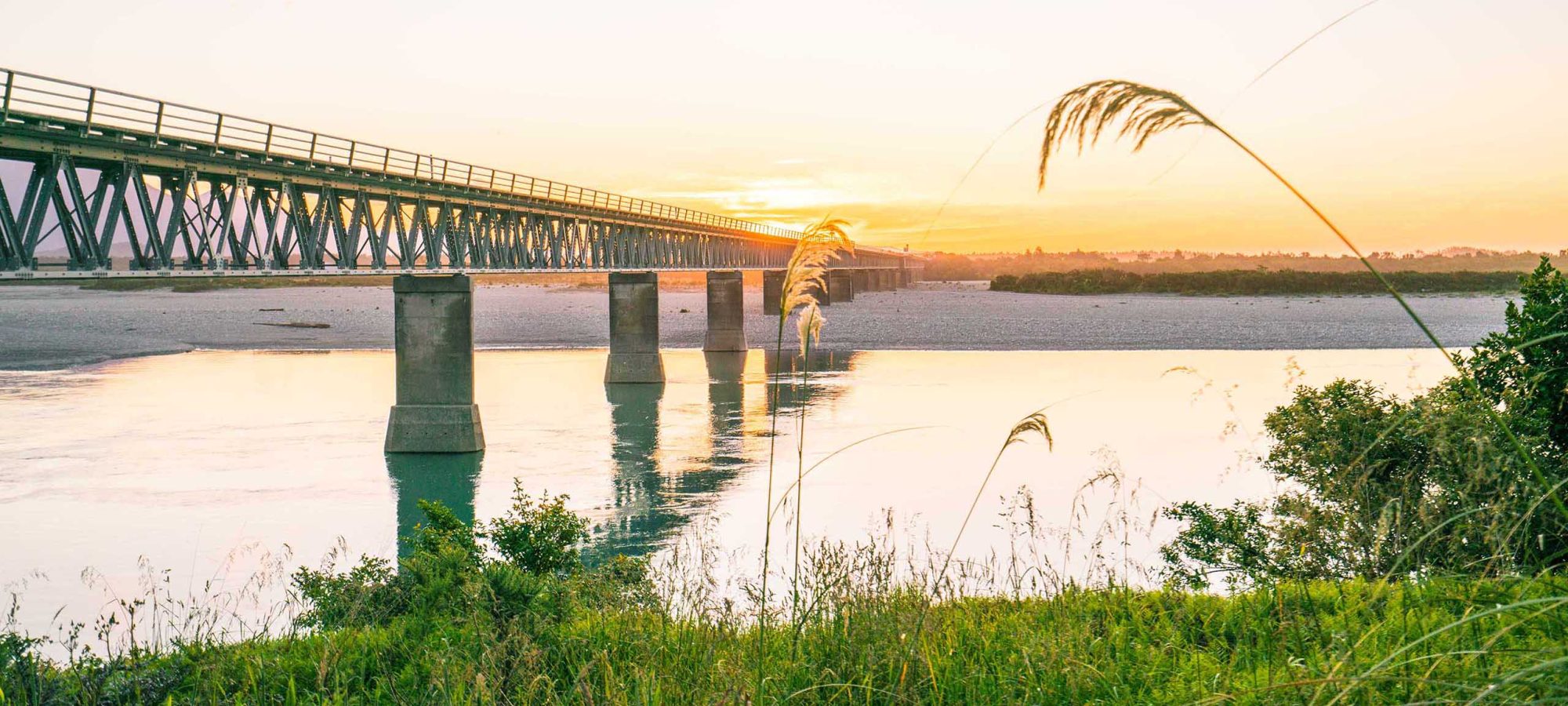 Region-West-Coast-Bridge-Sunset-Banner