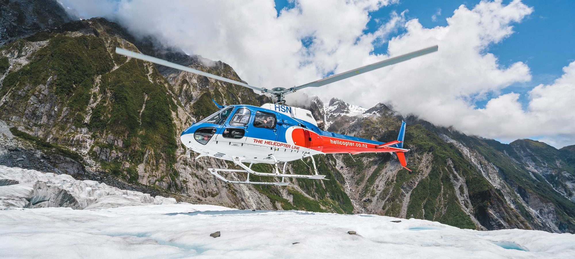 Region-West-Coast-Glacier-Helicopter-Landing-Banner