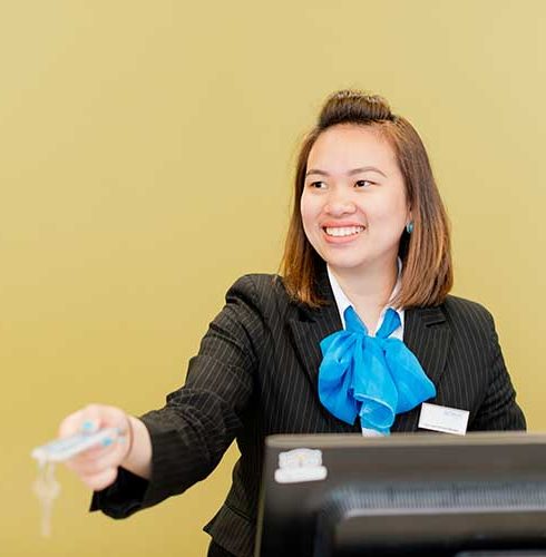 Scenic-Hotel-Dunedin-City-Reception-Key-Handover-People-Small