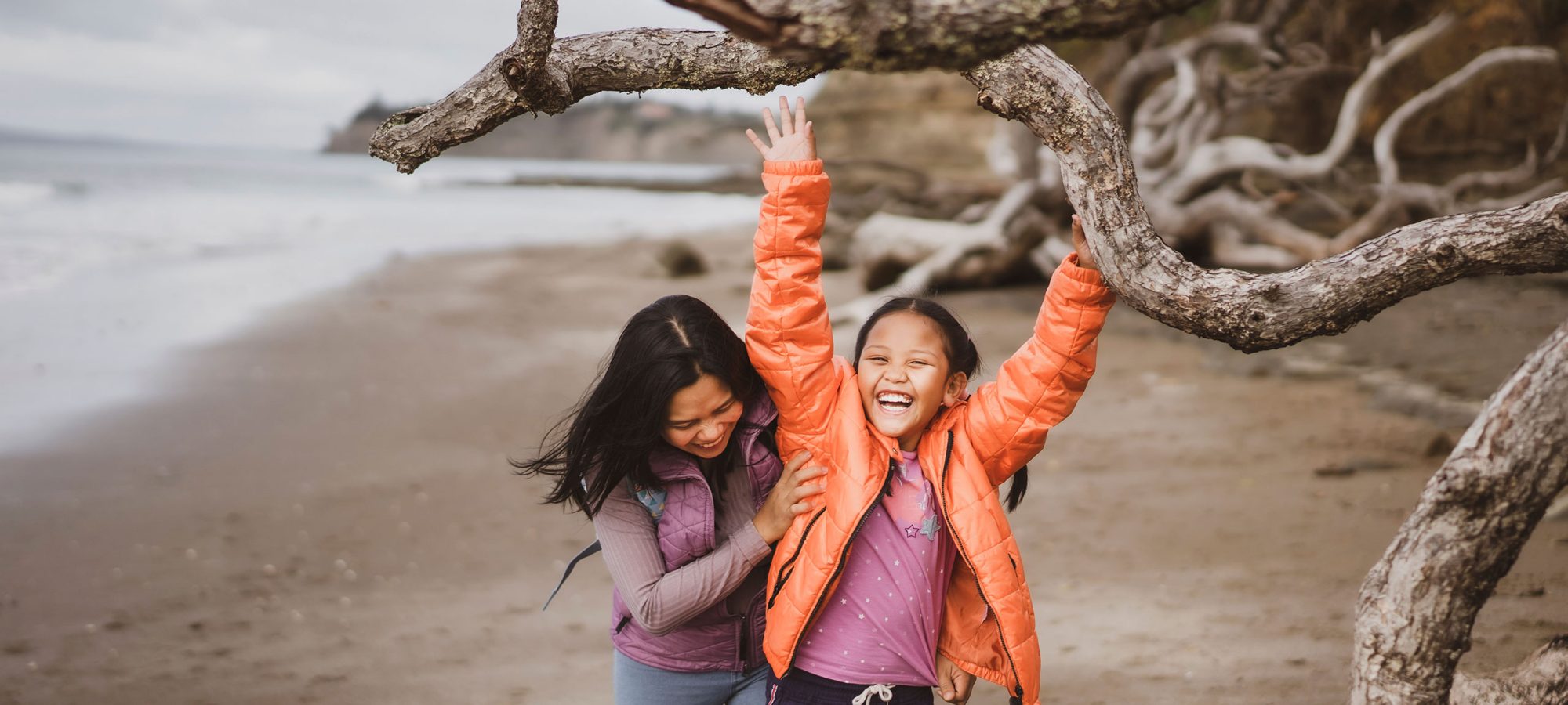 Two-Children-Playing-on-Beach-Banner