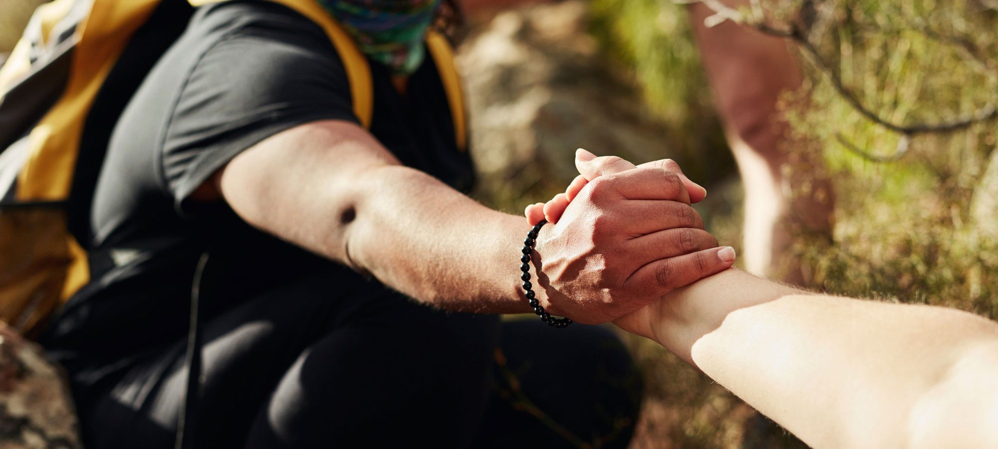 Two-People-Handshake-Helping-Hand-Hiking-Banner